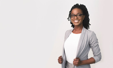 African American Business Girl Smiling At Camera, Studio Shot