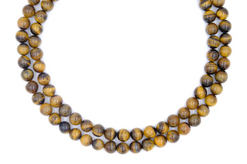 tiger eye stone beads necklace isolated on white background