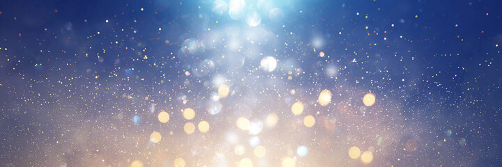 abstract glitter silver, purple, blue and gold lights background. de-focused. banner - Powered by Adobe