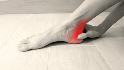 Foot anatomy with red highlight on painful area.  Ankle pain may cause from muscle strain, Achilles...