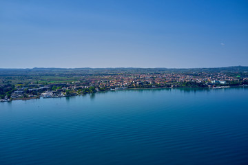 Naklejka na ściany i meble Panoramic view of the town of Rivoltella del Garda Italy. Aerial view.