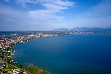 Obraz premium Panoramic view of the town of Rivoltella del Garda Italy. Aerial view.