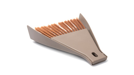 Small plastic hand dustpan and brush cleaning isolated on white background.