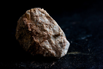 conglomerate stone isolate on black background