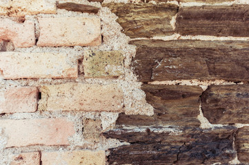 Brown and white brick wall outdoor background. Stone texture.