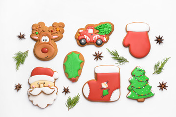 Tasty Christmas cookies on white background
