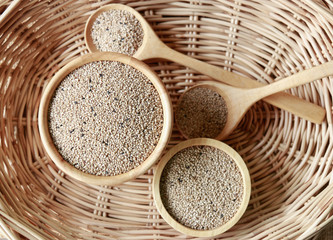 raw sesame on wooden bowl for healthy ingredient in cooking 