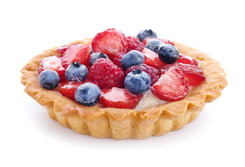 Sweet tartlet with berries on white background