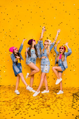 Vertical full body photo of four pretty cheerful positive excited charming carefree having fun...