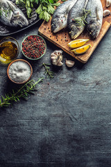 Mediterranean fish bream with spices salt herbs garlic and lemon. Healthy seafood. Concept of healthy sea food