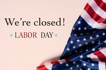 american flags and text we are closed, labor day