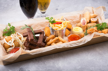 Different beer snacks served on a platter