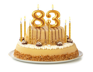 Festliche Torte mit goldenen Kerzen - Nummer 83