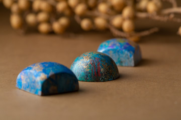 Sweet blue chocolate bonbons set close-up