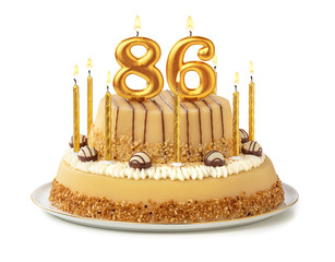 Festliche Torte mit goldenen Kerzen - Nummer 86