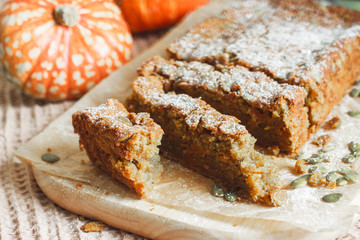 Pastry. Pumpkin muffin with cinnamon and seeds for breakfast