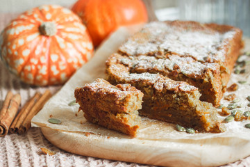 Pastry. Pumpkin muffin with cinnamon and seeds for breakfast