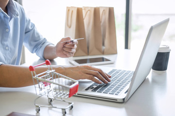 Woman using credit card register security code payments online shopping and customer service network connection market, using technology on laptop, Internet Online shopping or banking concept