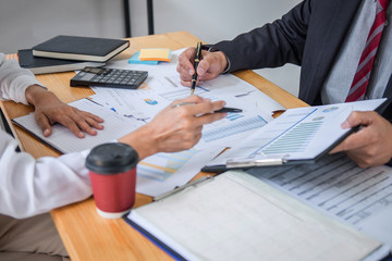 Two business team discussing and planning strategy company growth project success financial statistics, Partner meeting professional investor working start up project for both company with document