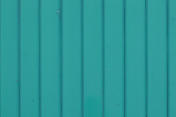 green plank wall background with vertical lines