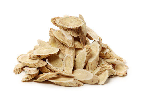 Chinese Herbal Medicine - Astragalus Slices, Huang Qi (Astragalus Propinquus) On White Background