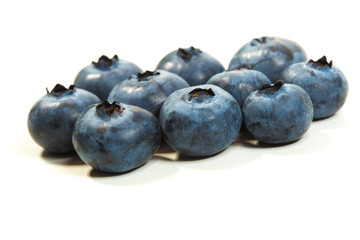 Fresh blueberries on white