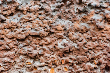Uneven orange cement surface