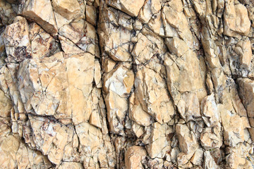Yellow rock textured detail background
