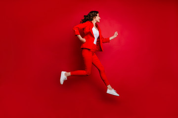 Fototapeta na wymiar Full side profile side photo of cheerful lady running having bright pomade isolated over red background