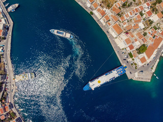 Image of bay with azure sea, highlands, sailing boat on summer.