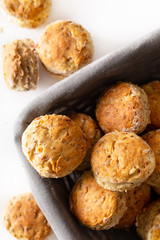 Food concept Fresh baked Homemade buttery, salty Ham and cheese scones on white background.
