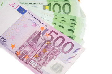500 and 100 euro banknotes isolated on a white background. View from above.