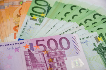 Euro banknotes close up. View from above.