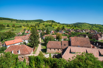 Fototapeta na wymiar Traditional german architecture in saxon village in Transylvania. Biertan, Sibiu County, Romania