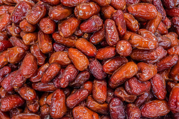 abstract background of sweet honey dates on the market close up