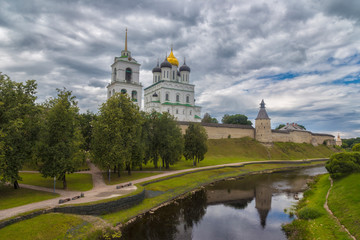 Kremlin in Pskov, Russia. Ancient fortress. Golden dome of Trinity Church.