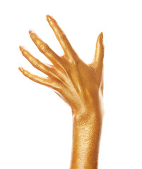 Hands in gold paint. Golden fingers. Female hand isolated on white background. White woman's hand showing symbols and gestures.