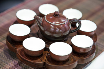 Asian tea set a wooden table