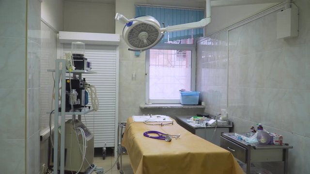 Operating room with medical equipment in a veterinary clinic. Table for surgical operations in the hospital.