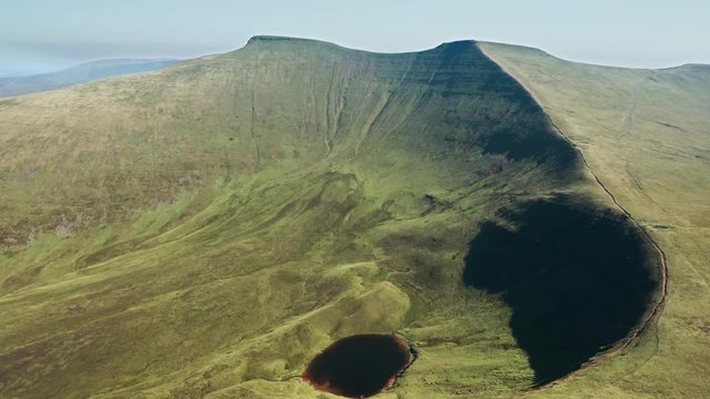 Aerial drone view of dramatic mountains of Pen-y-Fan and Corn Du in the Brecon Beacons, Wales