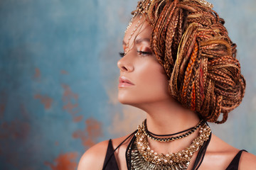Southern flavor. Close-up portrait of a young, gorgeous, fatal beauty with an afro braid hairstyle.