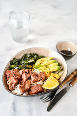 Vegan healthy bowl with rice, salad and jackfruit on dark backround