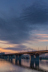 Bridge over the Yenisei river evening sunset. Krasnoyarsk, Russia. vertical