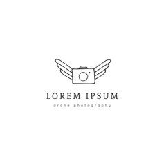 Flying photo camera. Aerial photography logo template. Hand drawn vector icon.