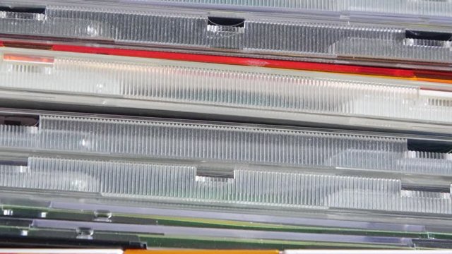 Pile of CD or compact discs with empty background.