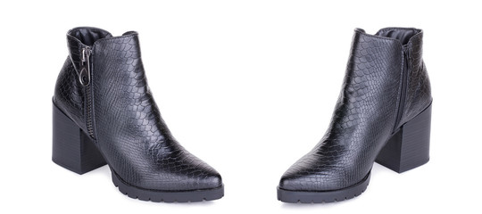 Pair of classical woman leather ankle boots booties shoes. Two isolated.