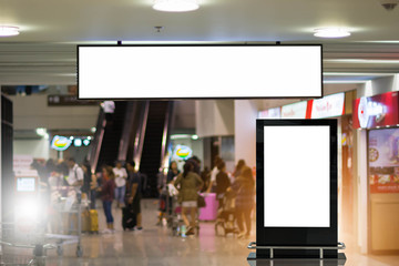 two blank advertising billboard at airport background large LCD advertisement