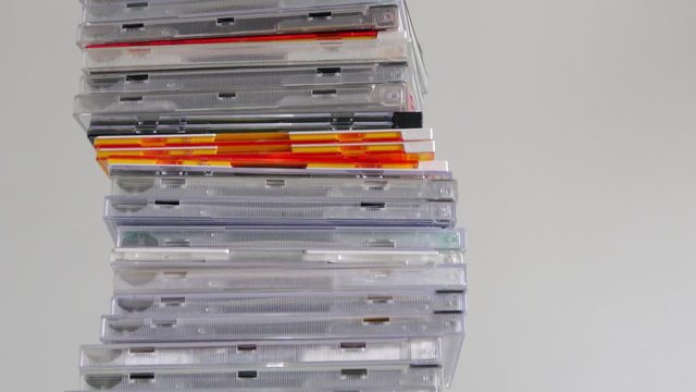 Pile of CD or compact discs with empty background.