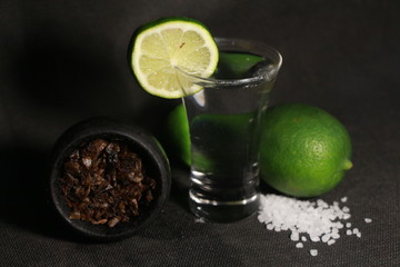 bowl with hookah tobacco. berries on a black background. sheesha smoking