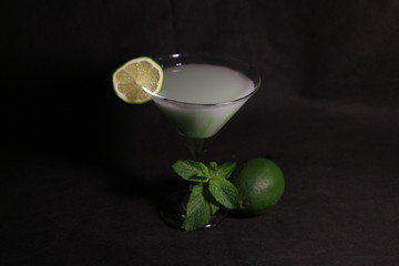 bowl with tobacco for hookah. berries on a black background. smoking nargile